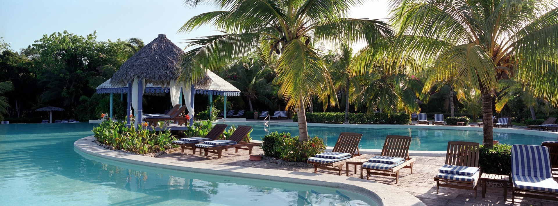 Romantic all-inclusive resort by the sea—offering a serene escape designed for couples through personalized travel planning by Curated Passports.